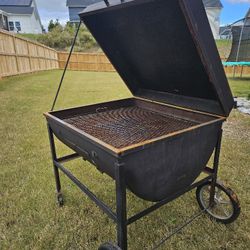 "PIG OR CHARCOAL GRILL!!"