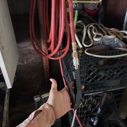 Air compressor with hose