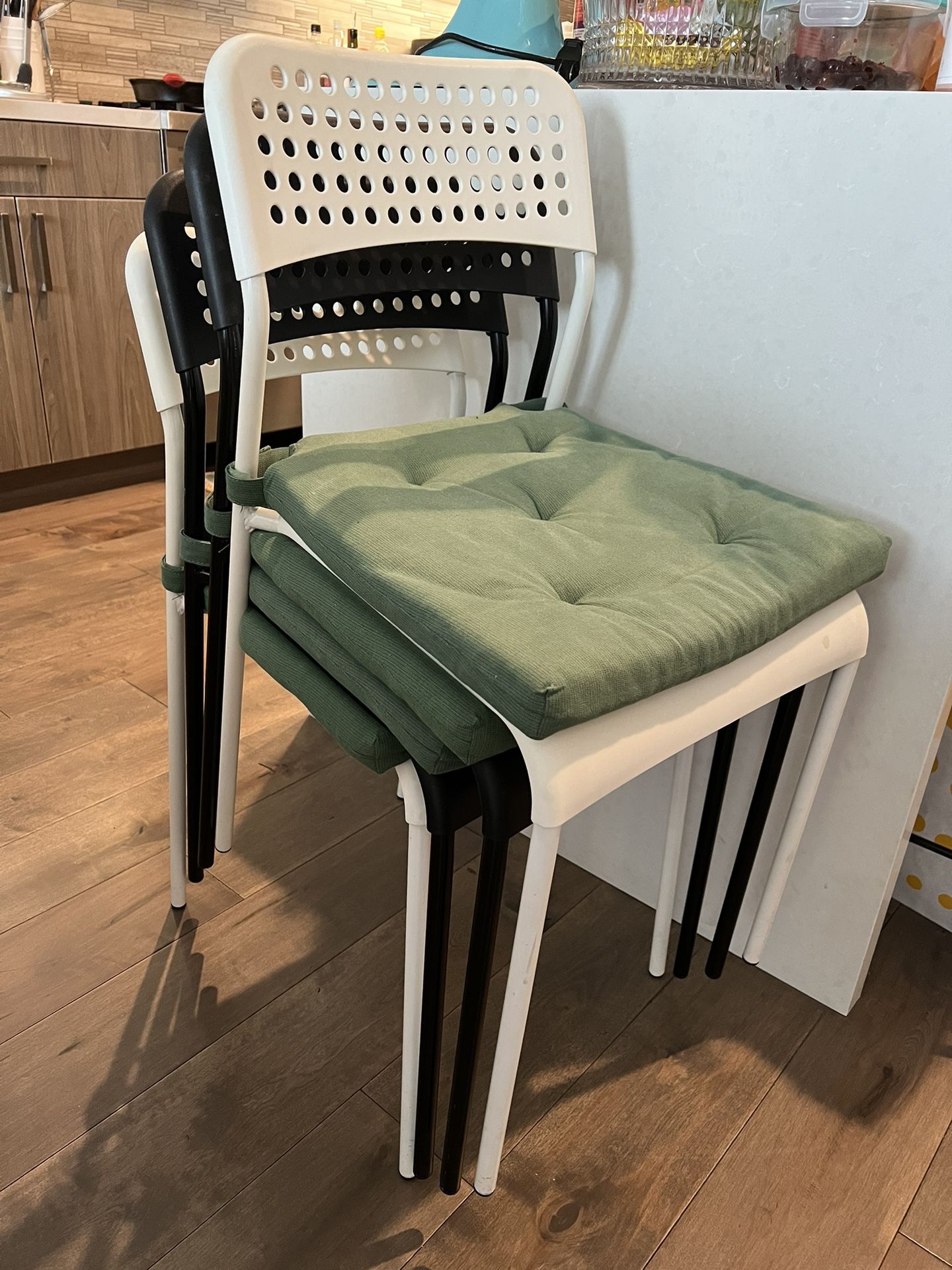 IKEA Plastic Chairs With Green Cushions