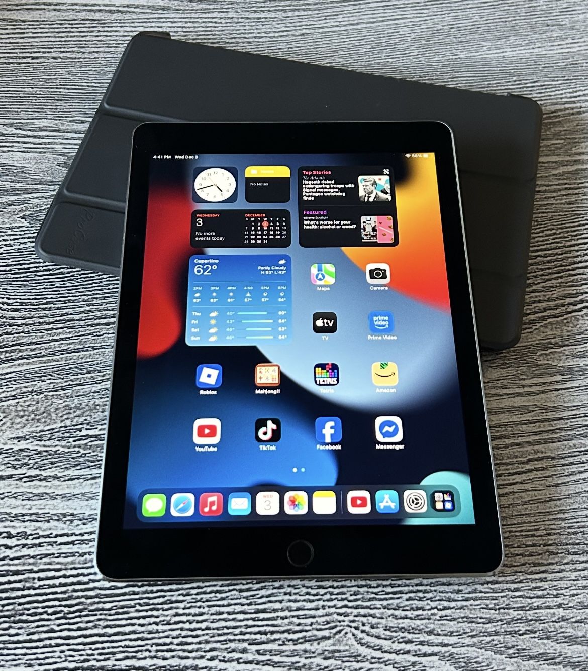 Apple iPad Air 32GB A1566 in excellent condition with protective case, and charge cord.  $65