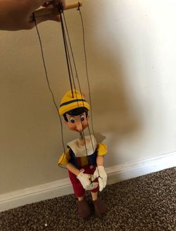 Wooden Disney Pinocchio Marionette and In good condition.