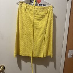 Vibrant yellow A-line skirt by Express. Textured woven fabric with subtle pattern. Includes slim self-tie belt. Clean, tailored seams and gentle flare