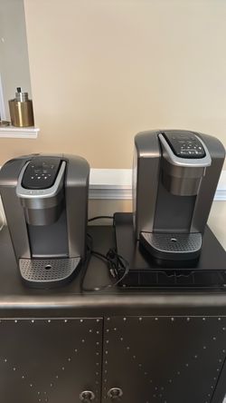 Two Keurig Single-Serve Coffee Makers and k pod holder