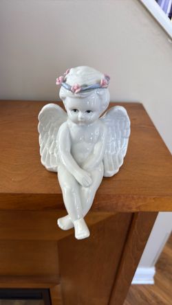 Shelf sitting baby angel