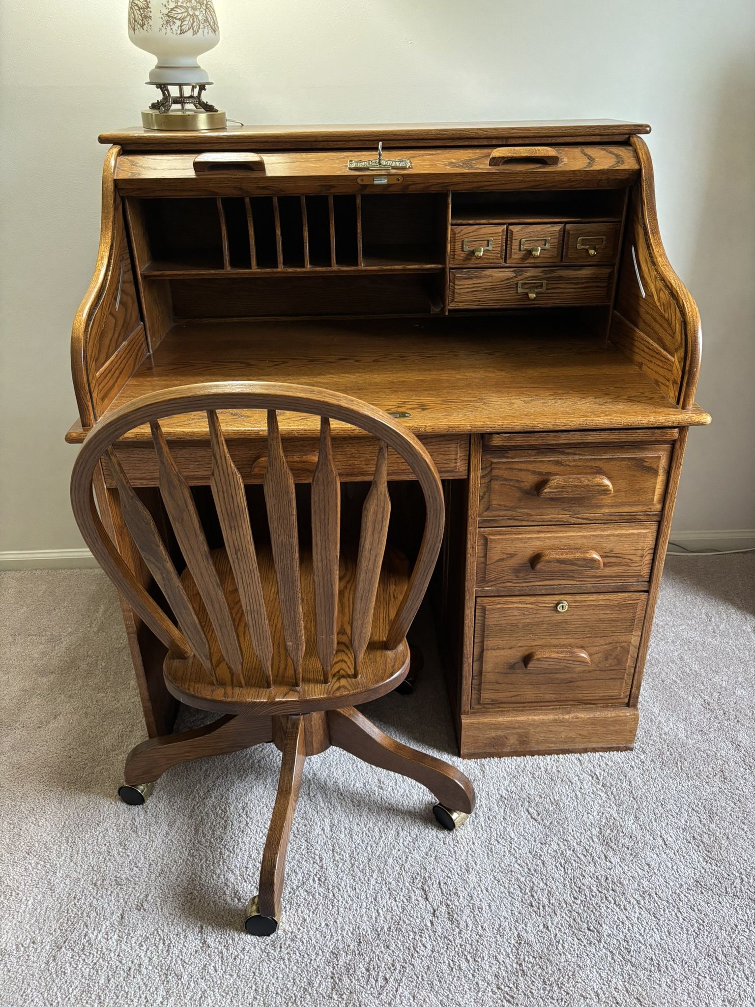 Vintage Winners Only Oak Roll Top Desk 42W With A Vintage Oak Spindle Back Swivel Desk Chair, excellent condition.