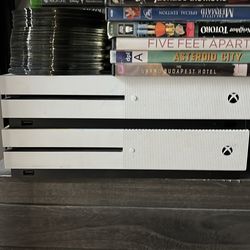 White Xbox One S with games