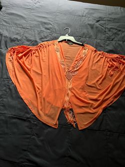 There is two pieces it Capri pants in size 12  blouse size small both for $25