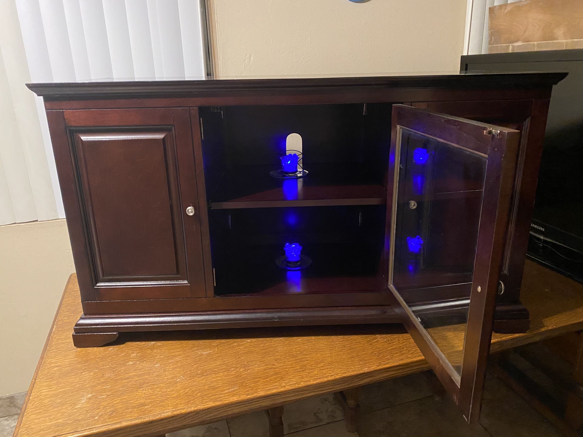 Cherrywood cabinet (real Wood) And with shelves on each end and middle. Check out my other items on my profile page