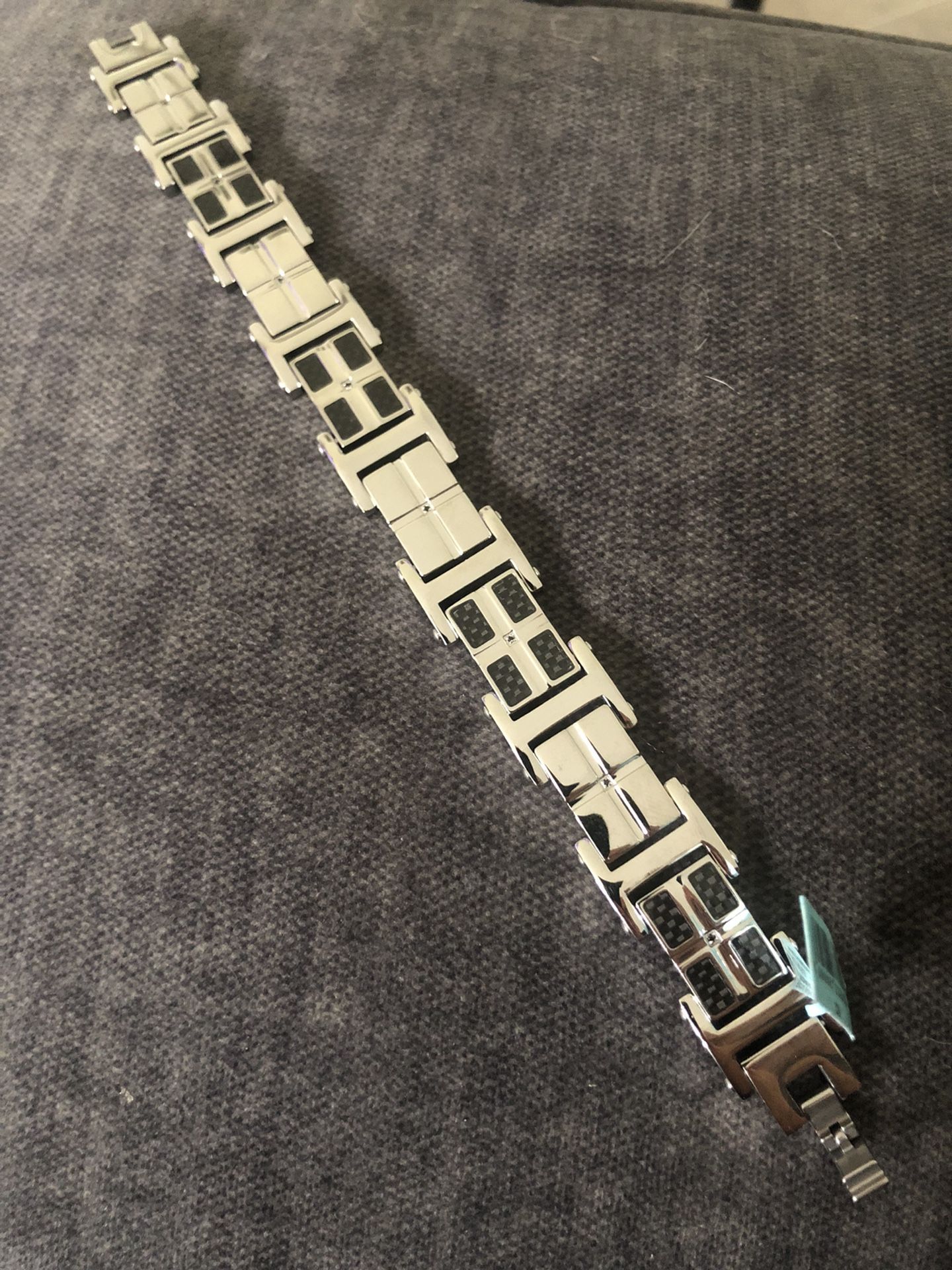 Mens stainless steel cz diamond and carbon fiber bracelet.
