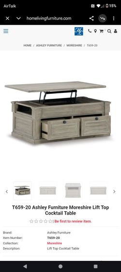 Lift up top with storage coffee table