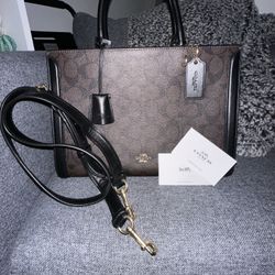 COACH Zoe Carryall Tote Crossbody In Signature Brown BlackCOACH Zoe Carryall Tote Crossbody In Signature Brown Black for Sale in Gilbert AZ OfferUp