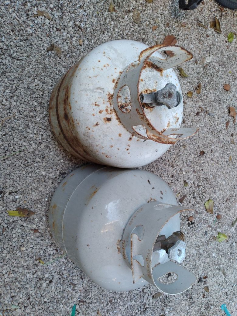 2 empty propane tanks