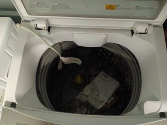 Portable washer and dryer with attachments  and carts to sit them on with wheels, and carts to set them on for height elevation.