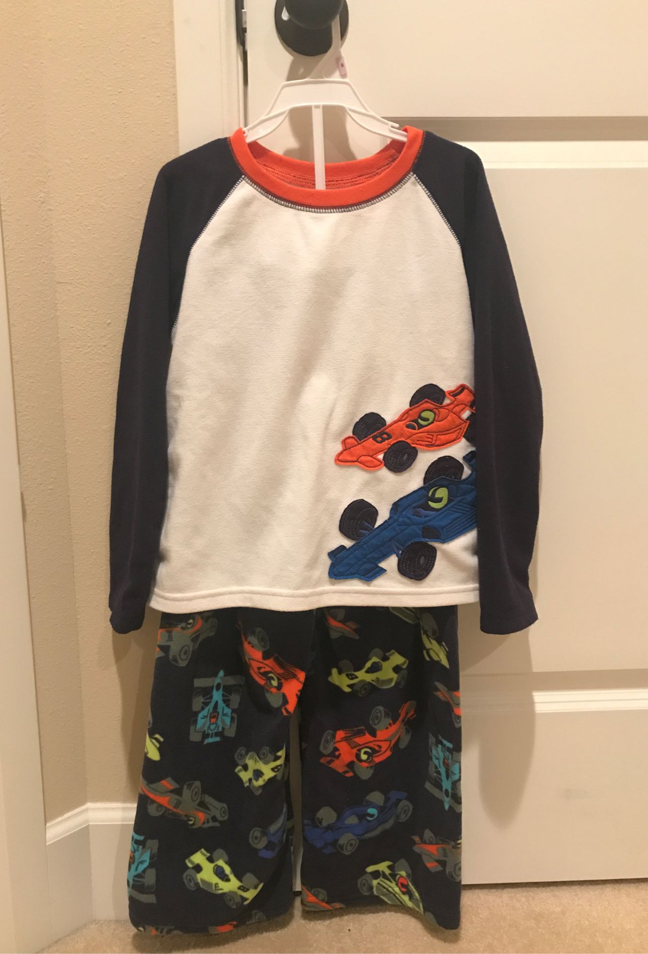 Carter’s brand 2-piece soft fleece pajama set (race cars theme)
