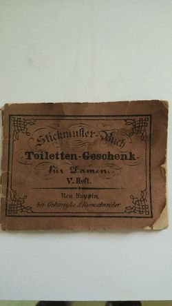 Old small book . With different style alphabets ,with the name v.heft