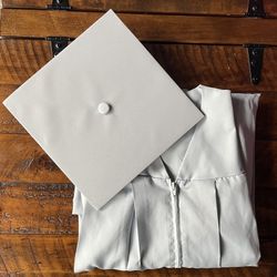 Silver Graduation Cap And Gown