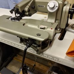Tacsew blind hemming industrial sewing machine model T1718-2 with motor and table. 