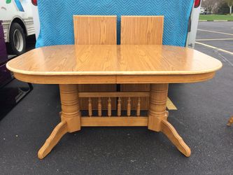 Light oak dining table double pedestal base