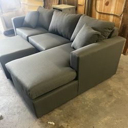 Brand New Grey Sectionals With Free Ottoman 