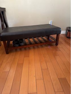 Brown leather ottoman bench and 2 matching storage ottomen