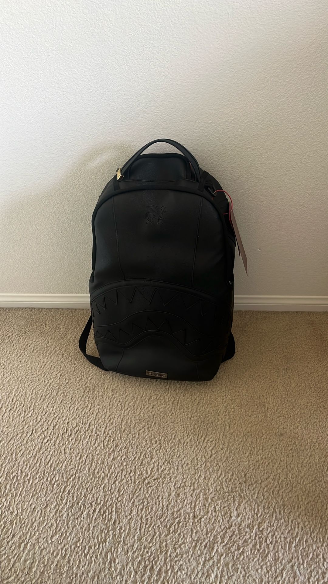 sprayground black and red backpack