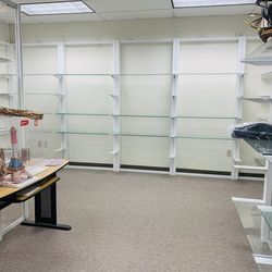 Wall-mountedglass display shelving for sale