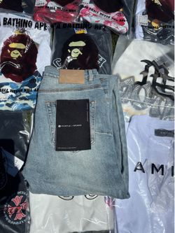 Purple jeans size 32, brand new with bag.