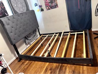 Queen upholstered bed frame with mattress