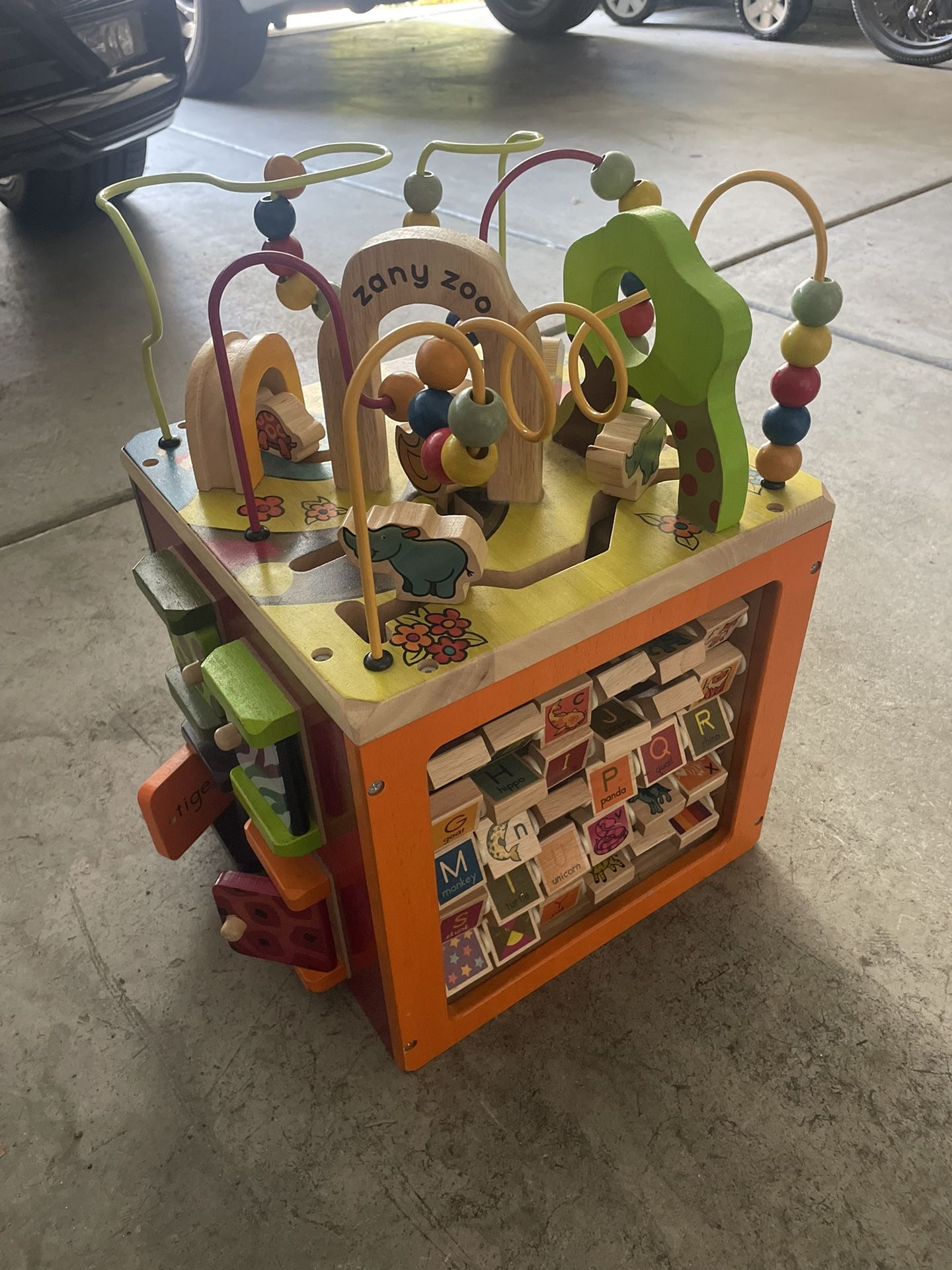 B. toys Wooden Activity Cube