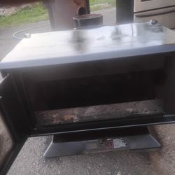 Wood Stove Cleaned Up And Freshly Painted 