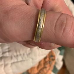 This is a Vintage Fredrick Goldman White And Yellow gold wedding Band with a hammered finish 13 Ish Size 14 K Gold 