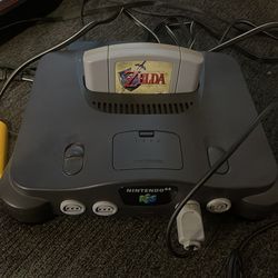 Nintendo 64 with Zelda, ocarina of Time and donkey Kong 64 Nintendo 64 with Zelda, ocarina of Time and donkey Kong 64