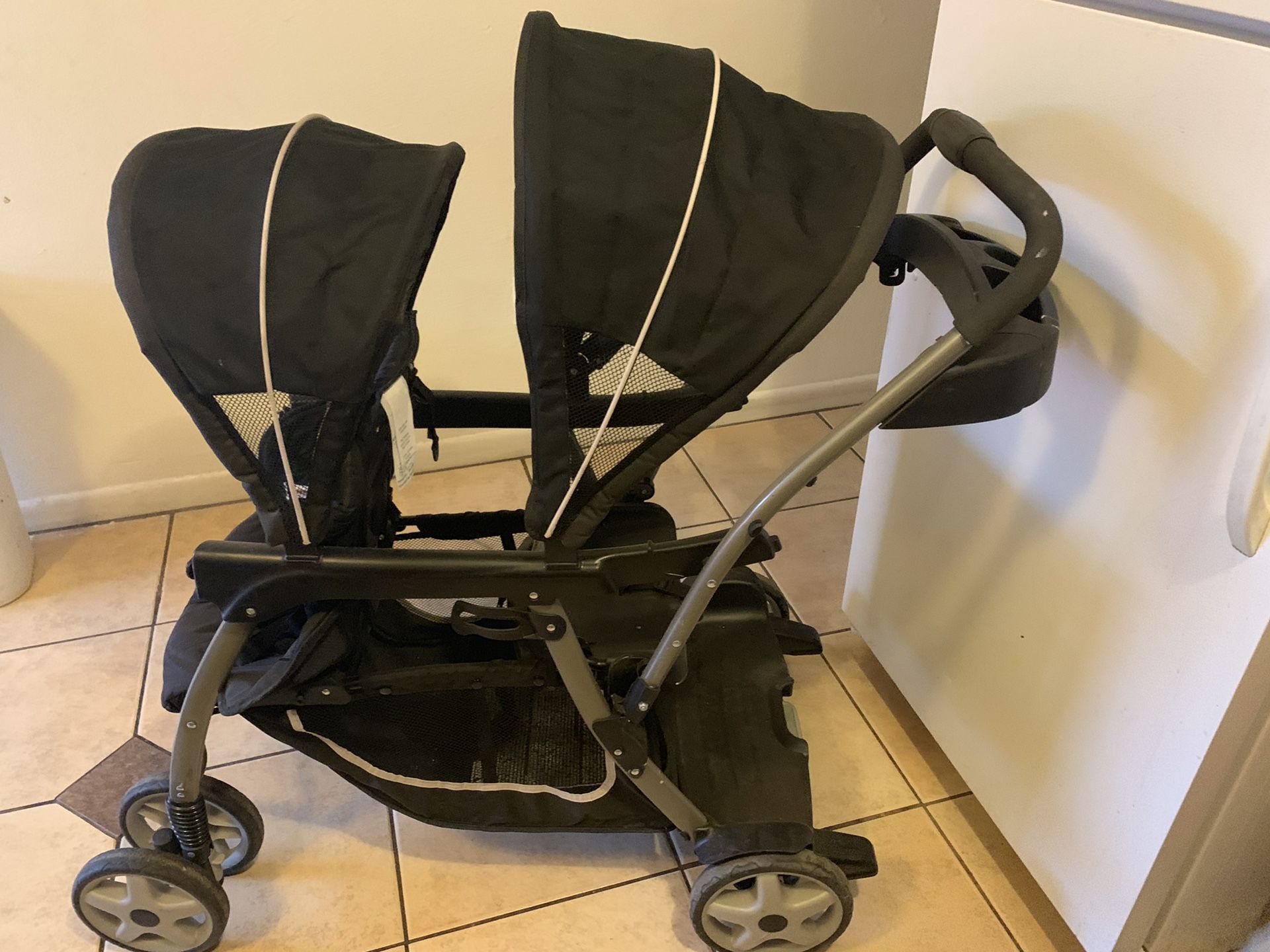 Graco Double Stroller Car seat. Stroller can sit or stand $80 OBO