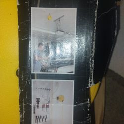 lamp that collects itself and base to put on the wall, new in box, never used.