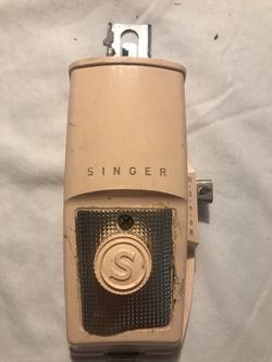 Singer sewing machine attachment