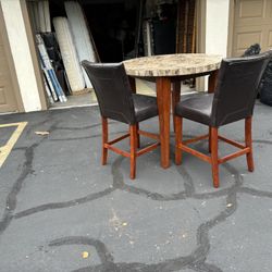 High Top Marble Table And 2 Leather Chairs 