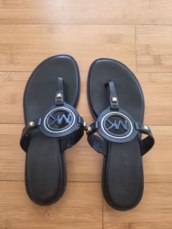 Leader MICHAEL KORS SANDELS