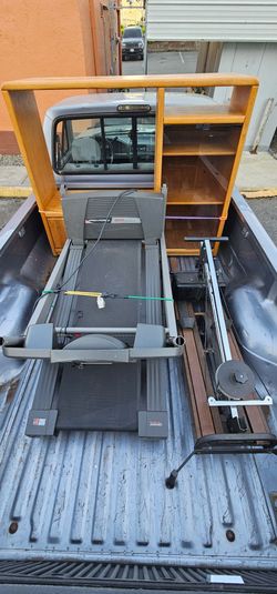 Entertainment center, treadmill, NordicTrack.