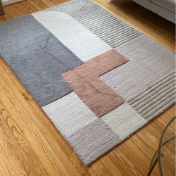 Neutral Pink, browns, and gray rug $50
