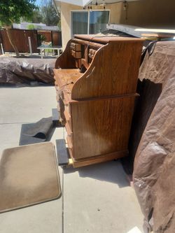 Free roll top desk 54x 26.5 x48 high if adds up is still available