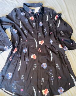 Cute never worn dress Sz Lg polyester material