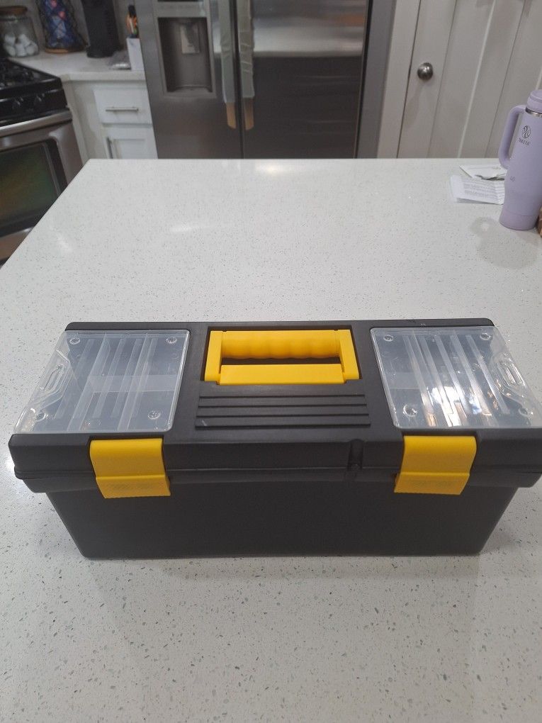 Lightly used small-midsize heavy duty plastic Tool box...Like new