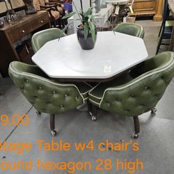 Mid century modern table w4 chairsWe are located at 2811 East Bell road. Another Time Around Furniture.
