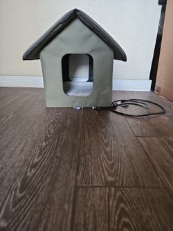 Small dog house with Bed warmer.