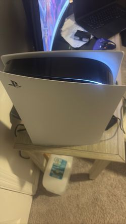 Sony PlayStation 5 Console with disc, two controllers, media remote(not in pictures), and charging station