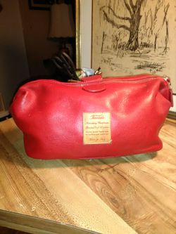Terrida Italian hand made red bay leather travel bag. New