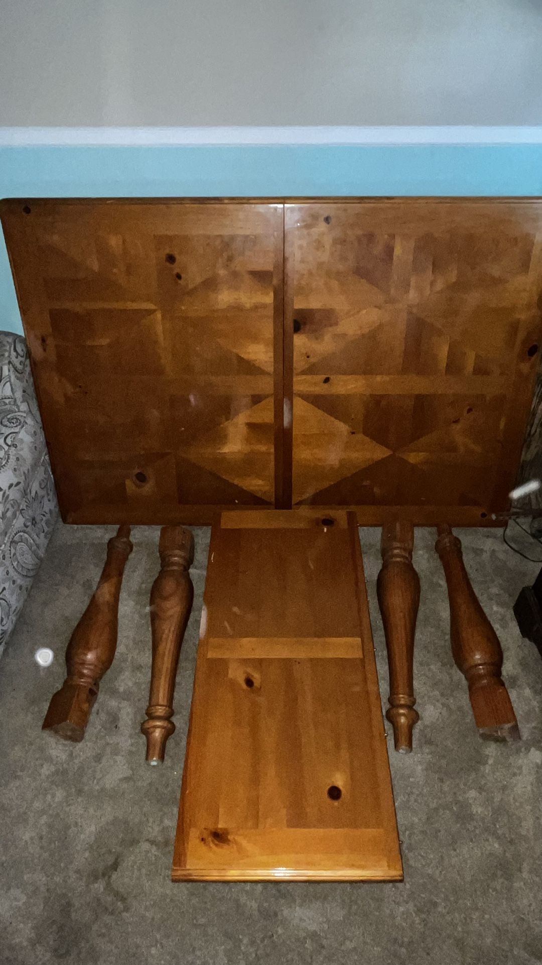 Wooden dining table, chairs, and an extra table keaf