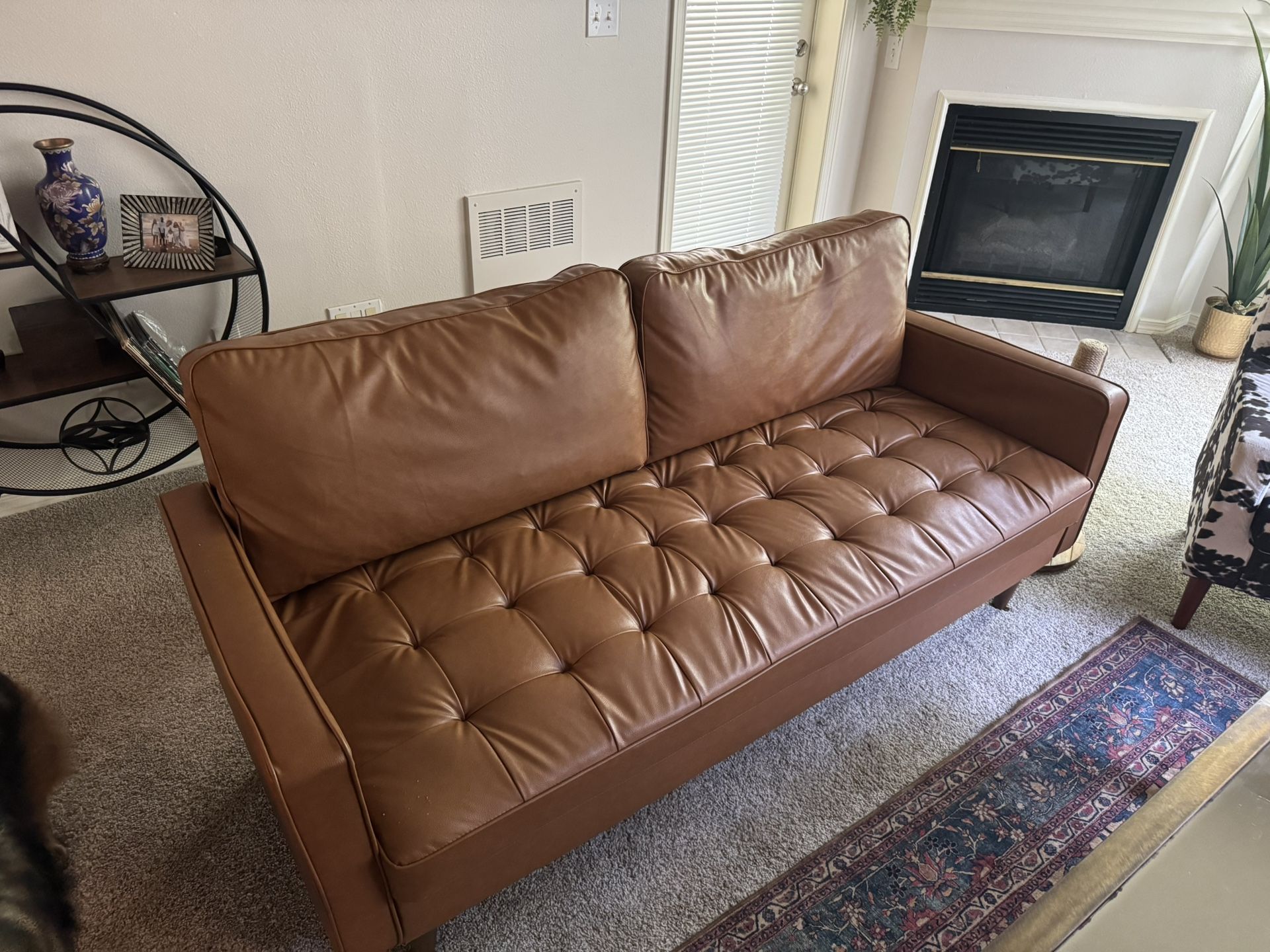 Small Brown “Leather” Couch