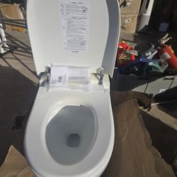 Moen 3 _Series Standard Electronic Cleansing Toilet With A Remote Control