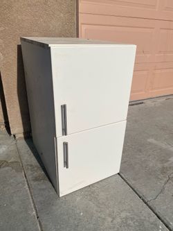 Kitchen cabinet top of fridge white